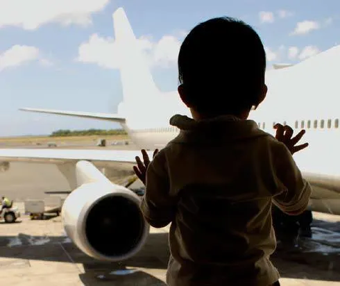 baby waiting for plane