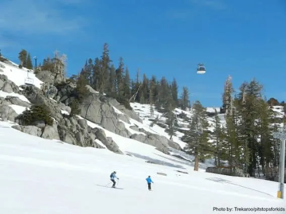 Squaw Valley Spring Skiing with Teens and School-aged Kids: squaw gondola on hill photo by: trekaroo/pitstopsforkids