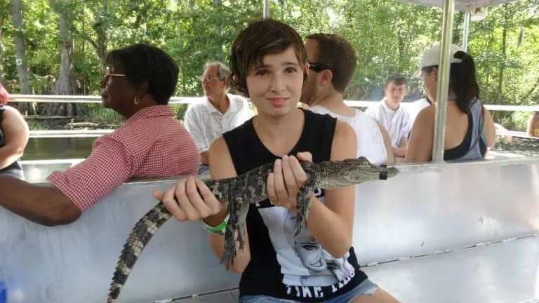 holding a gator is one of the fun things to do in Louisiana