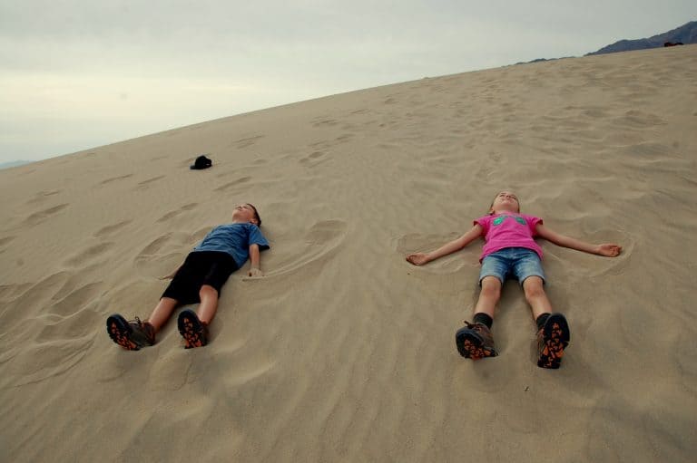 Making sand angels on the Mesquite Flat Sand Dunes in Death Valley National Park