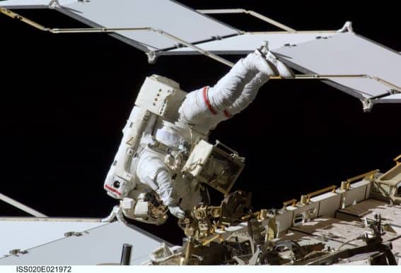 iss020e021972 space walk working on station