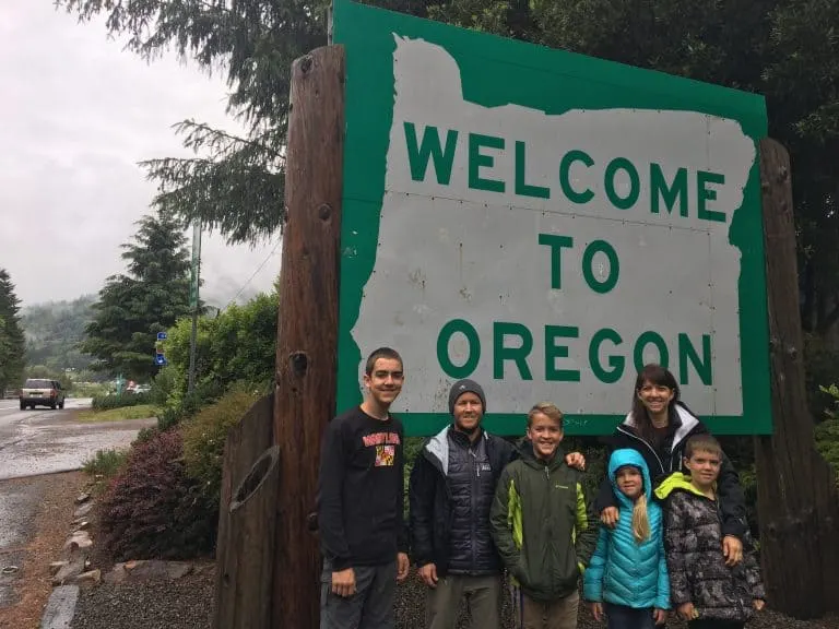 Oregon-State-Sign-with-families-by-Michelle-McCoy Redwood National Park with kids