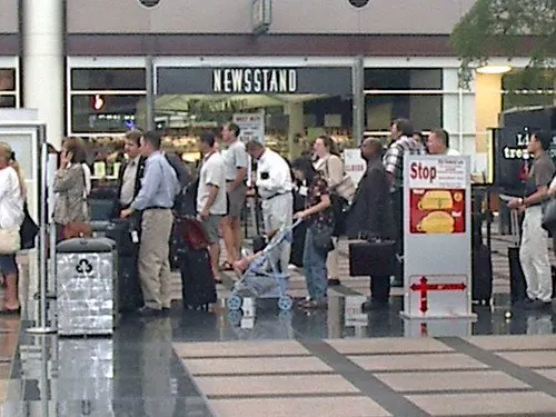 airport security line while flying with a baby