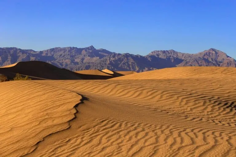 Things to do in Death Valley include rolling down sand dunes