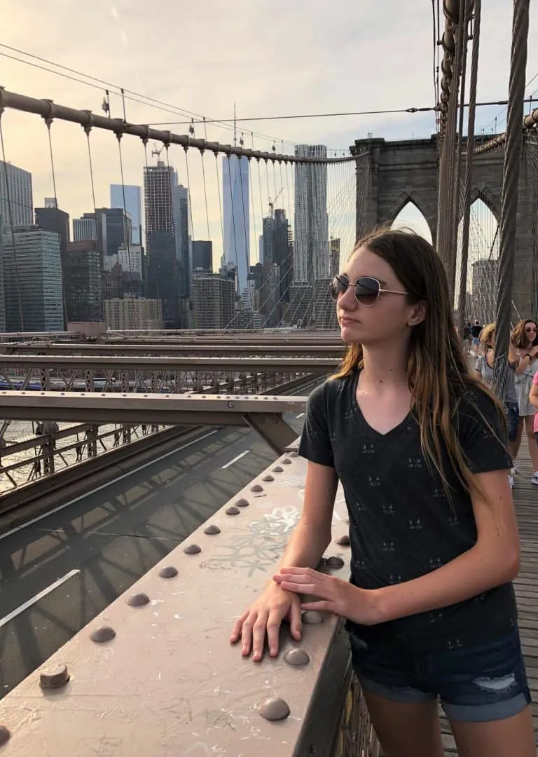 fun things to do in NYC with kids include walk ing or biking the Brooklyn Bridge 