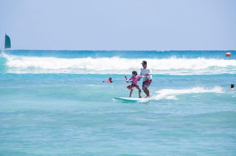 Surfing in Waikiki is one of the best things to do in Oahu with kids